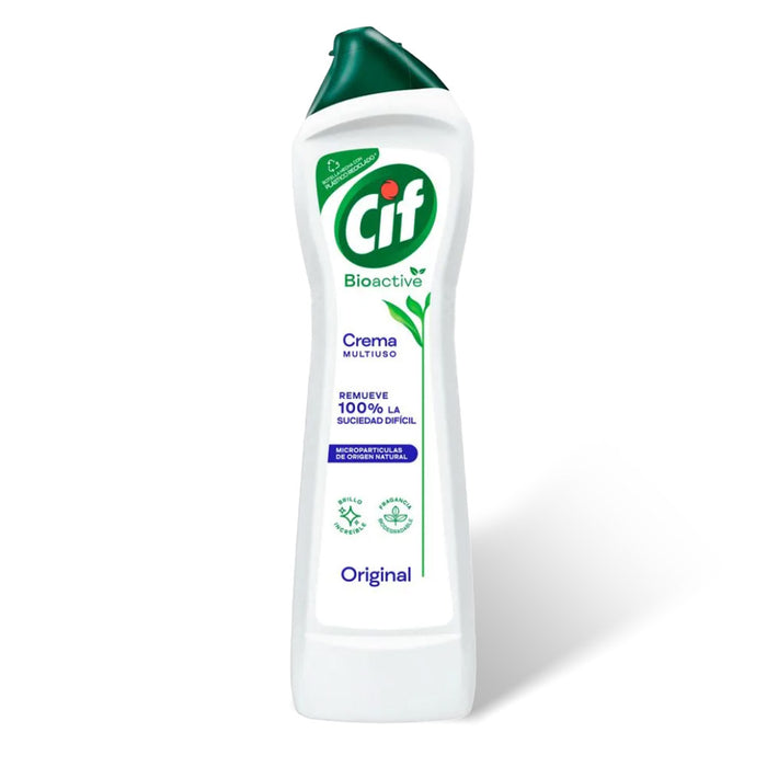 Una botella blanca de cig crema de Chile con tapón verde.