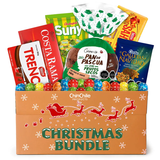 Caja navideña con varios aperitivos y dulces sobre fondo blanco.