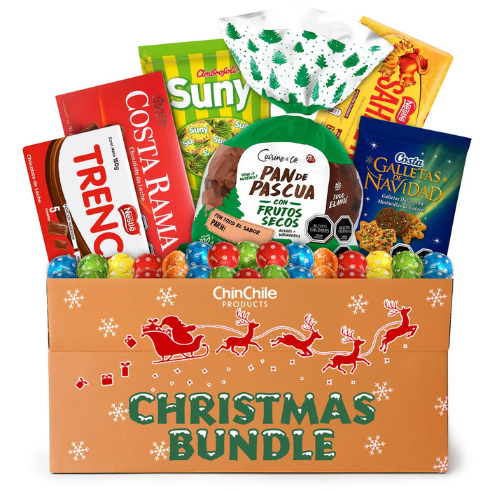 Caja navideña con varios aperitivos y dulces sobre fondo blanco.