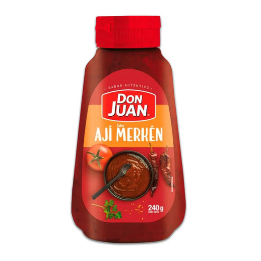 Una botella roja con tapón rojo de Aji Merken de Don Juan.