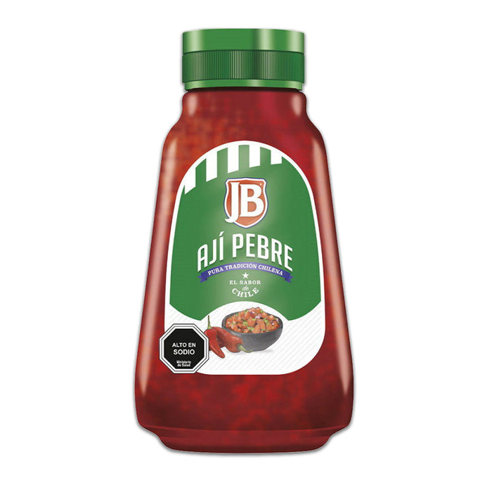 Una pequeña botella de Ají Pebre de JB con tapón verde. Un producto de Chile. 