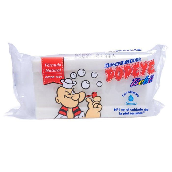 Una pastilla de jabón blanco para bebés con Popeye haciendo pompas.
